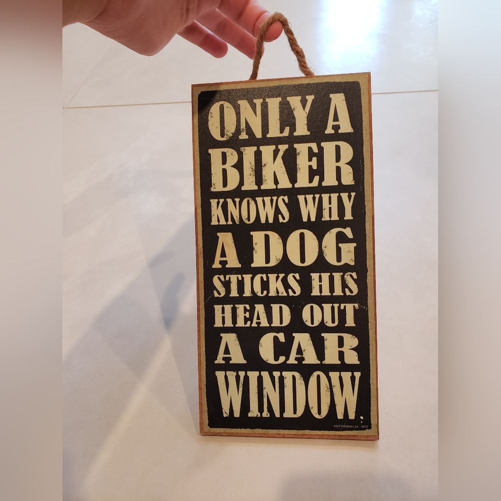 Only a biker knows why a dog sticks his head out a car window Hanging Wood Sign